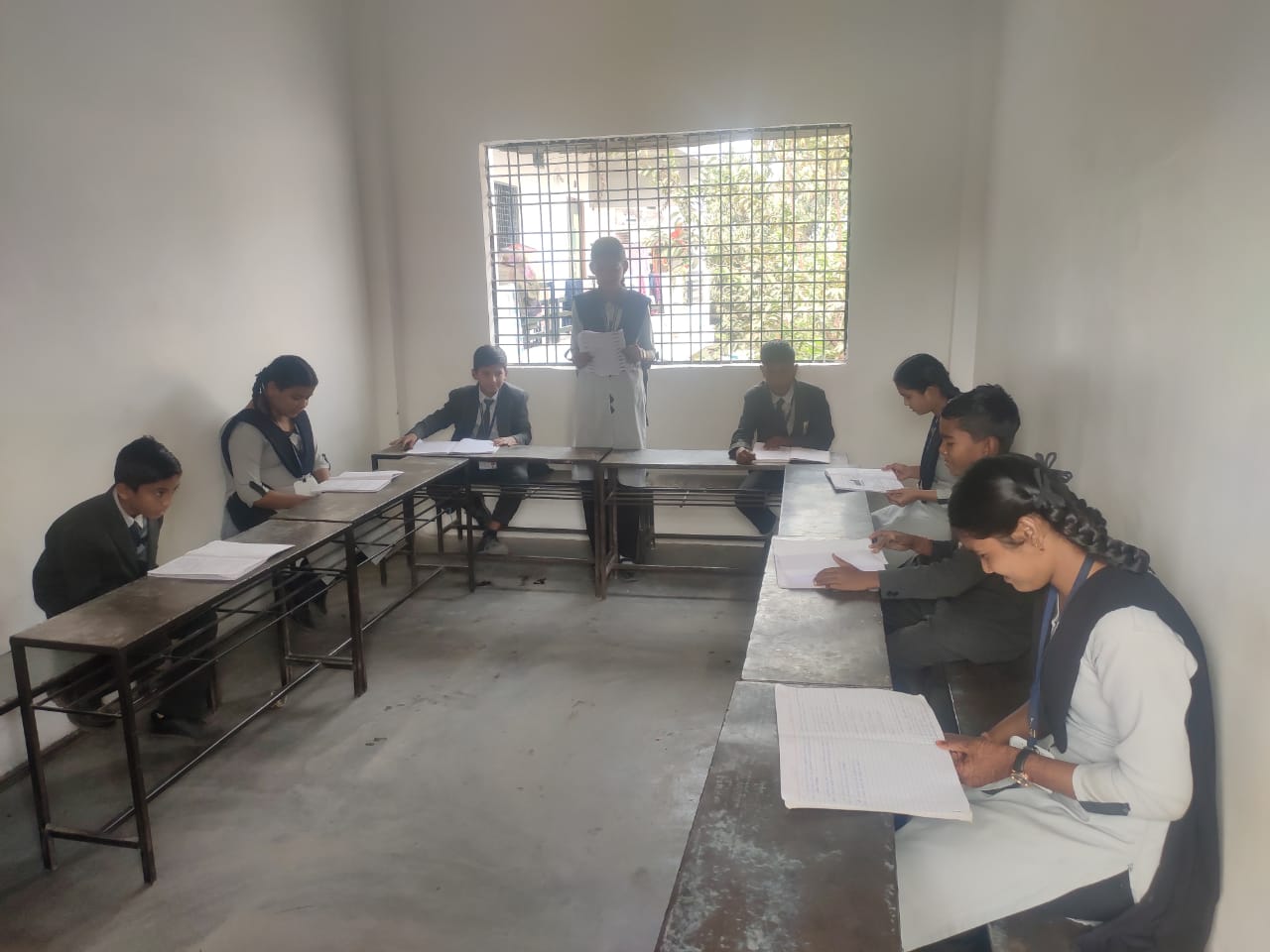 Teachers guiding with models